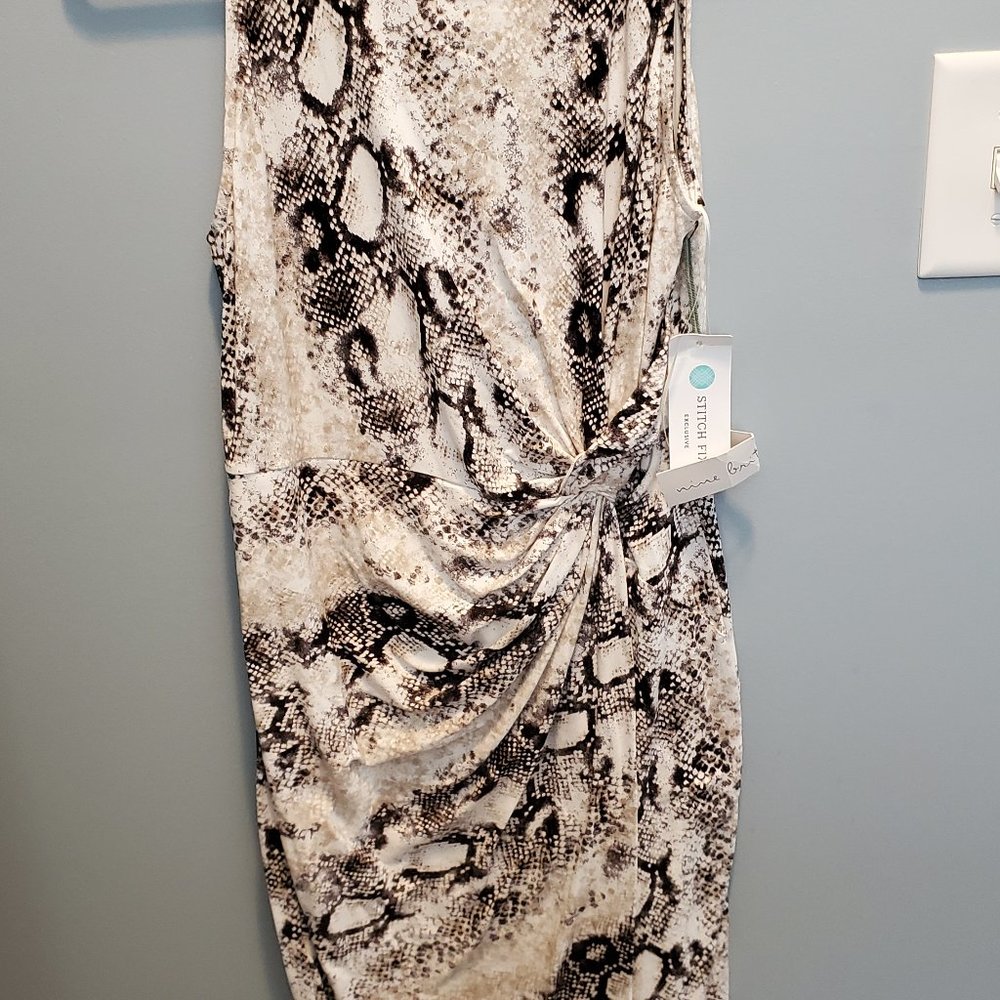 Cute snakeskin look sleeveless tank style dress.  NWT